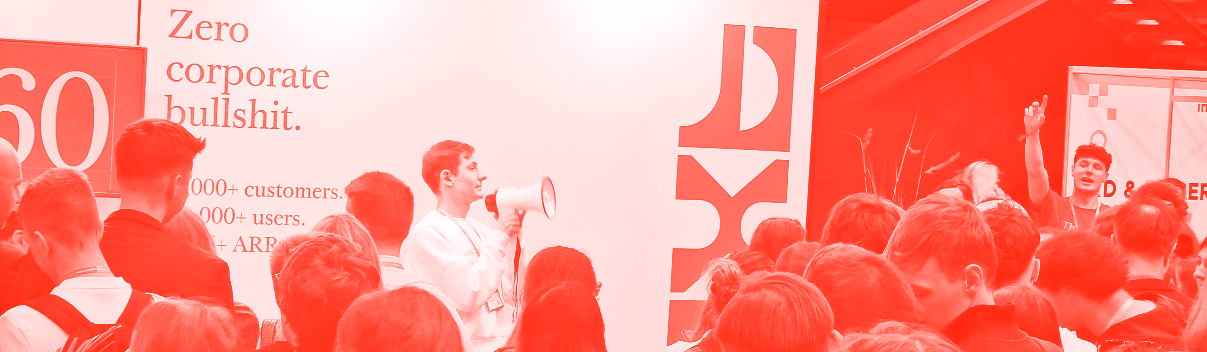 The Text team on stage at a company event